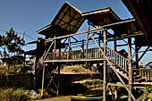 Inle Lake Myanmar. All the buildings are constructed on piles. Residents travel around by canoe, but there are also bamboo walkways and bridges over the canals, monasteries and stupas. 